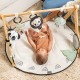 Active gymnastics Tiny Love Luxe Gymini από τη σειρά Black&White Décor, με στρογγυλό πατάκι διαμέτρου 92 cm, ξύλινη καμάρα και επιλογή 6 παιχνιδιών, 0m+